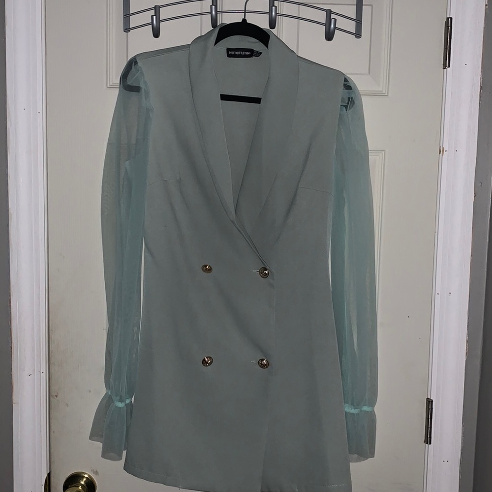 Cute mint colored suit dress.